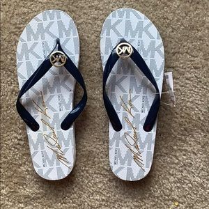 Micheal Kors white,navy blue and gold flip flops
